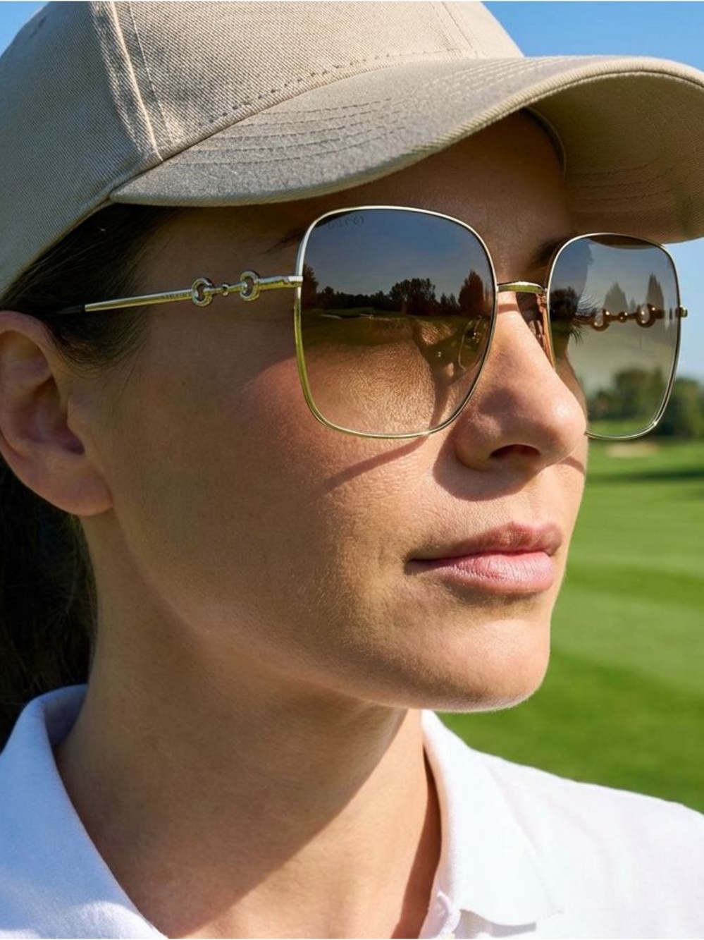 Gucci GG0879S Gold Frame Sunglasses with Yellow-Tinted Lenses